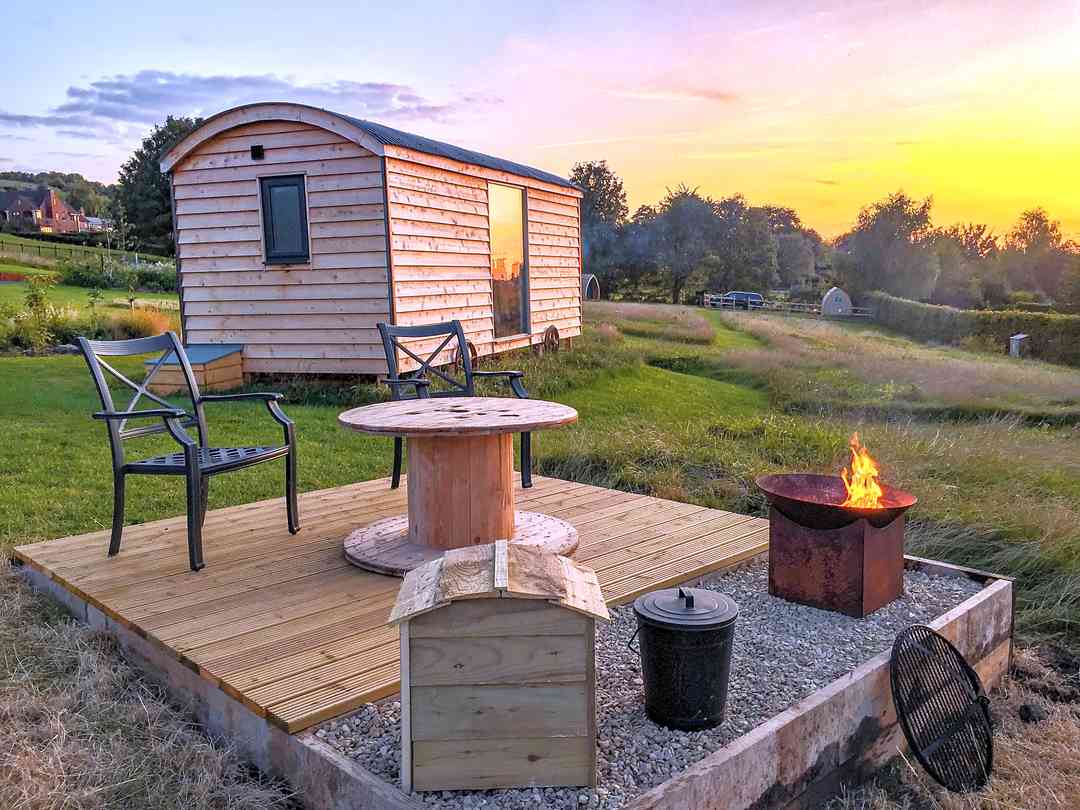 Slades Farm Glamping: Sunset over the firepit