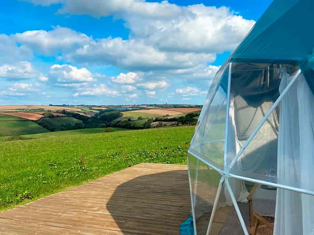 Devon Dome Glamping: The geodome sits on a large decked platform that's great for soaking up the summer sun