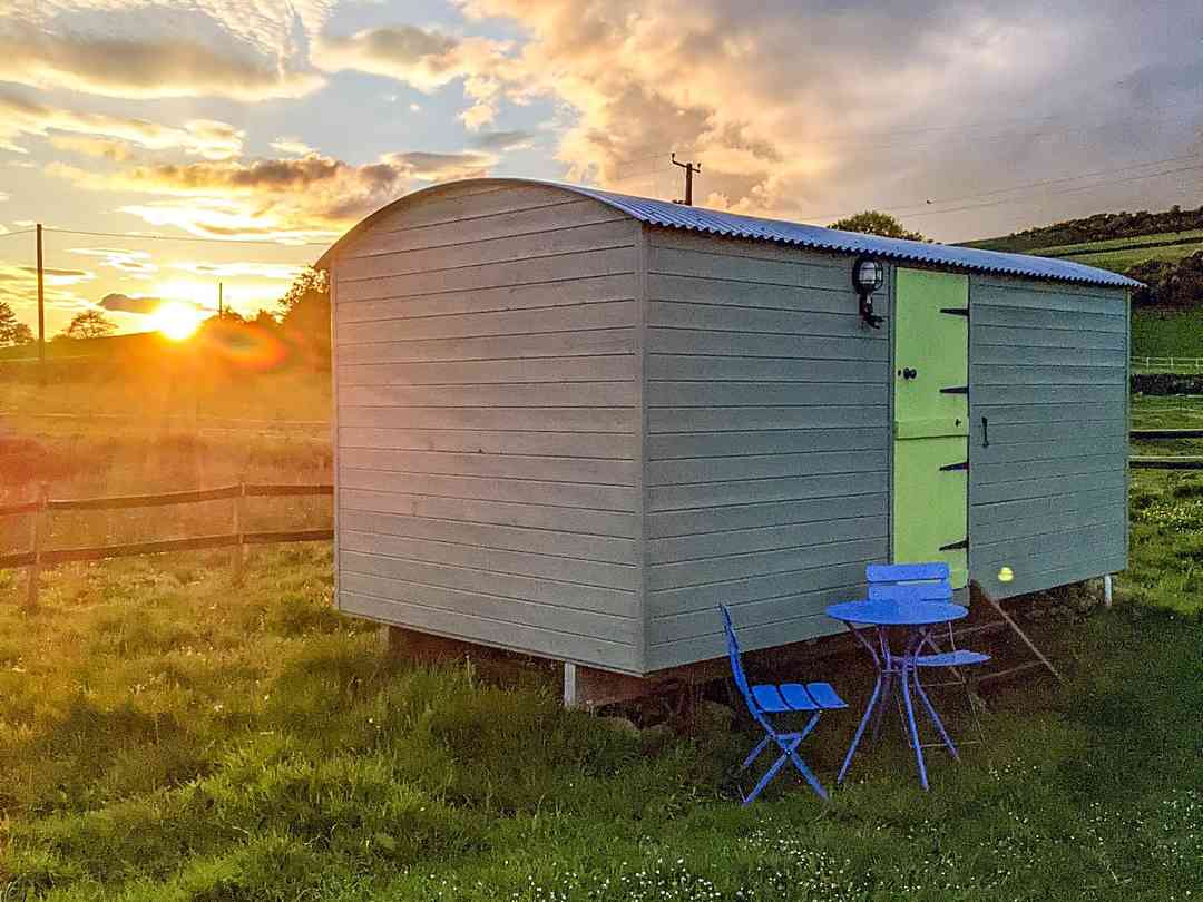 Corriehall Stopover: Visitor image of one of the shepherd's huts at sunset