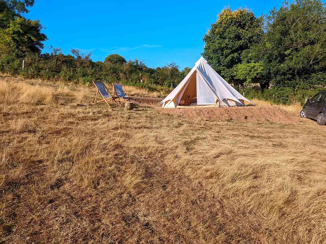 Yellands Farm Camping and Glamping: summer field setting of the tent