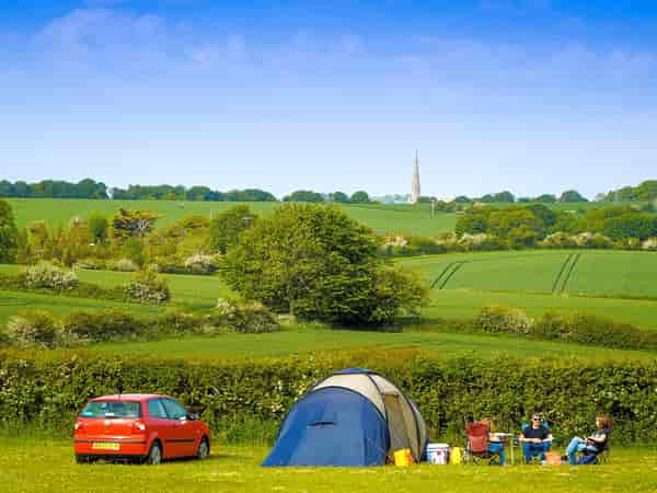 Non-electric grass tent or trailer tent pitch
