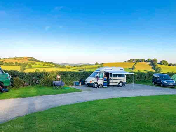 Electric hardstanding and grass touring pitch