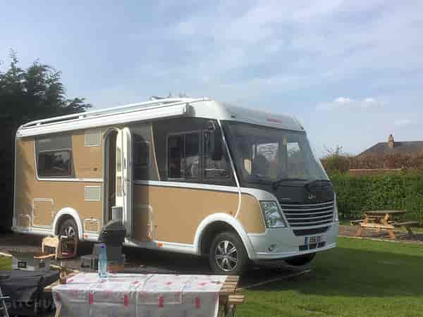 Powered concrete slab caravan site
