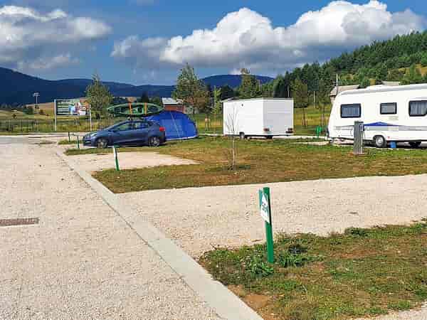 Fully-serviced grass and gravel pitch