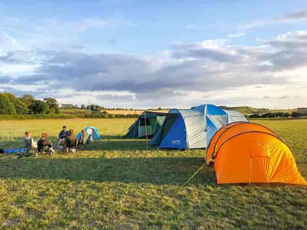 Primitive grass tent or campervan site