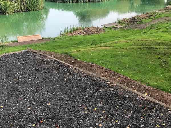 Electric gravel and hardstanding motorhome pitch (lake view)