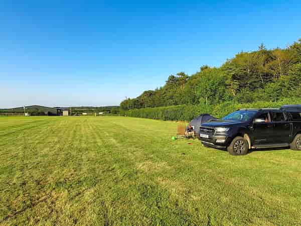 Non-electric grass tent or trailer tent pitch