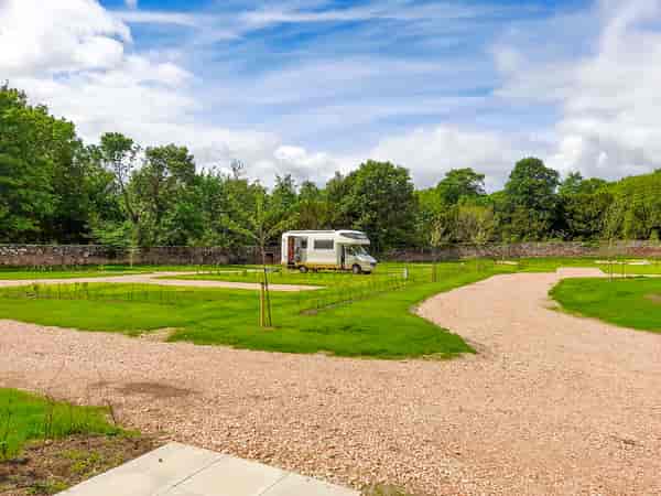 Electric hardstanding and grass touring pitch