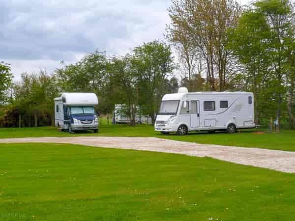 Fully-serviced grass touring pitch