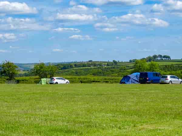 Non-electric grass tent or motorhome pitch (private bathroom amenities)