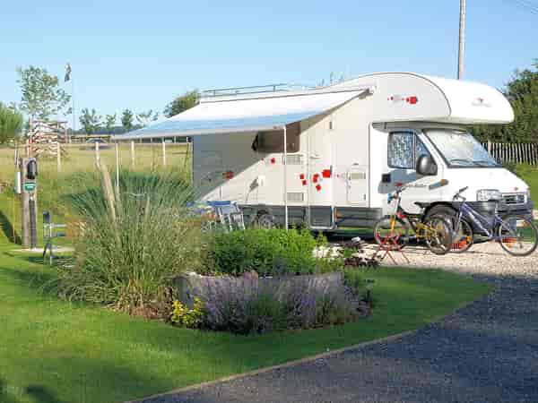 Silver fully-serviced hardstanding and grass touring pitch