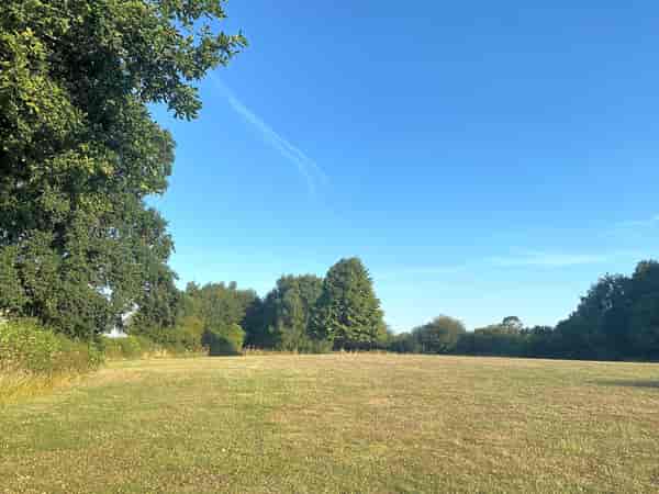 Primitive grass travel trailer site