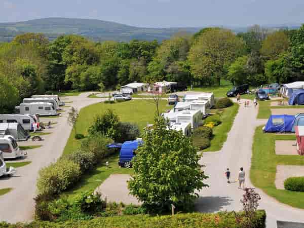 Super fully-serviced grass and gravel pitch