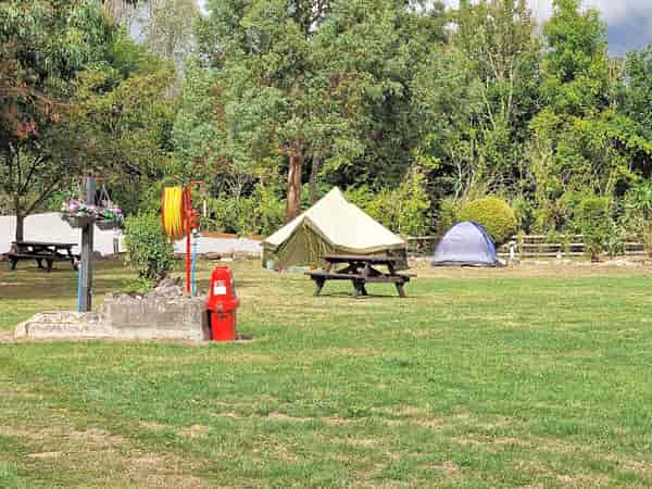 Non-electric grass tent pitch