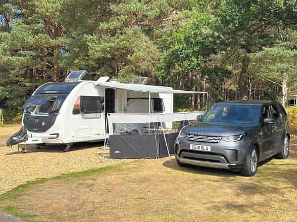 Fully-serviced hardstanding and grass pitch