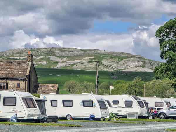 Fully-serviced hardstanding touring pitch