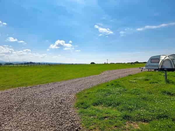Fully-serviced grass and gravel touring pitch