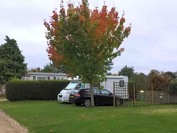 Fully-serviced grass and gravel touring pitch