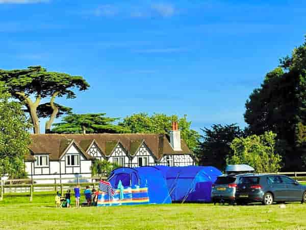 Non-electric grass and earth tent or trailer tent pitch