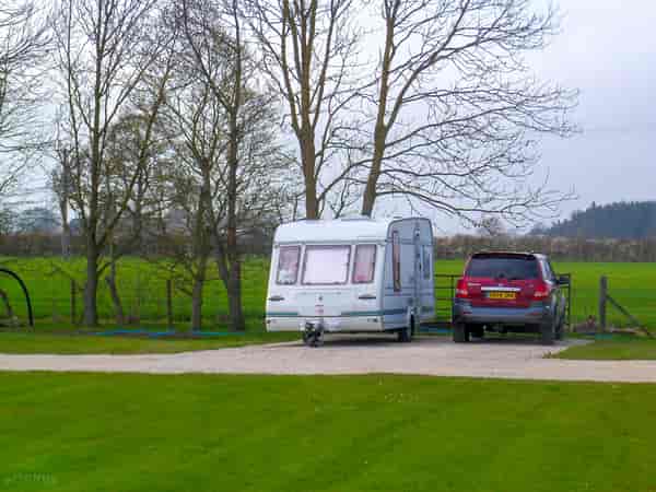 Fully-serviced hardstanding touring pitch