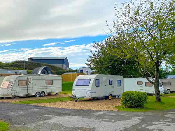 Electric grass and gravel touring pitch