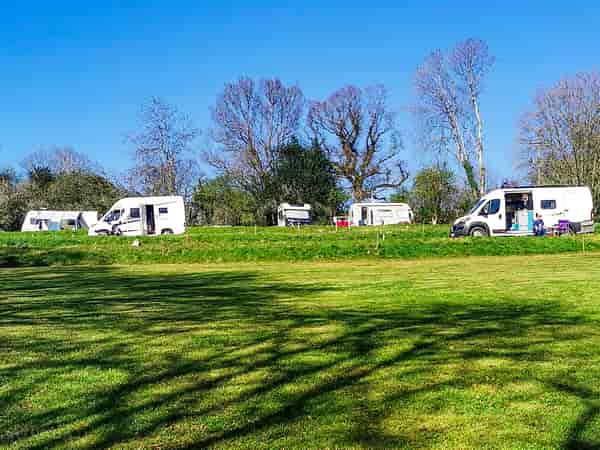 Non-electric grass and earth touring pitch