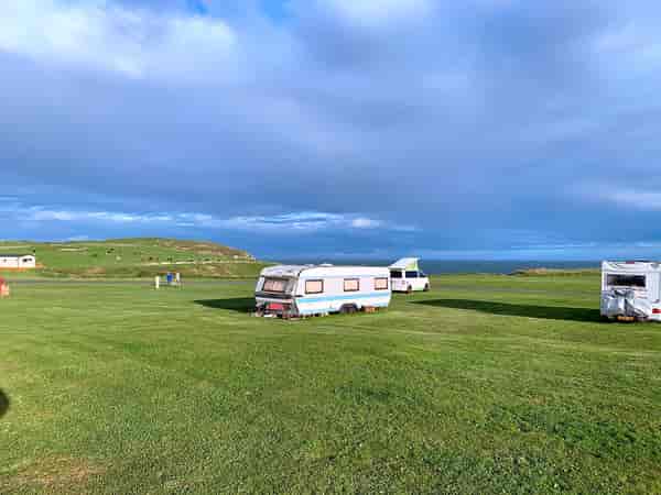 Powered grass caravan site