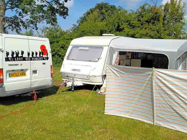 Electric optional hardstanding and grass touring pitch