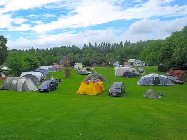 Unpowered grass tent site