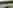 Electric hardstanding and grass touring caravan pitch (no awning)