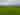 Electric grass pitch (sloping)