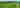 Non-electric grass tent pitch (no pets, sloping, two person)