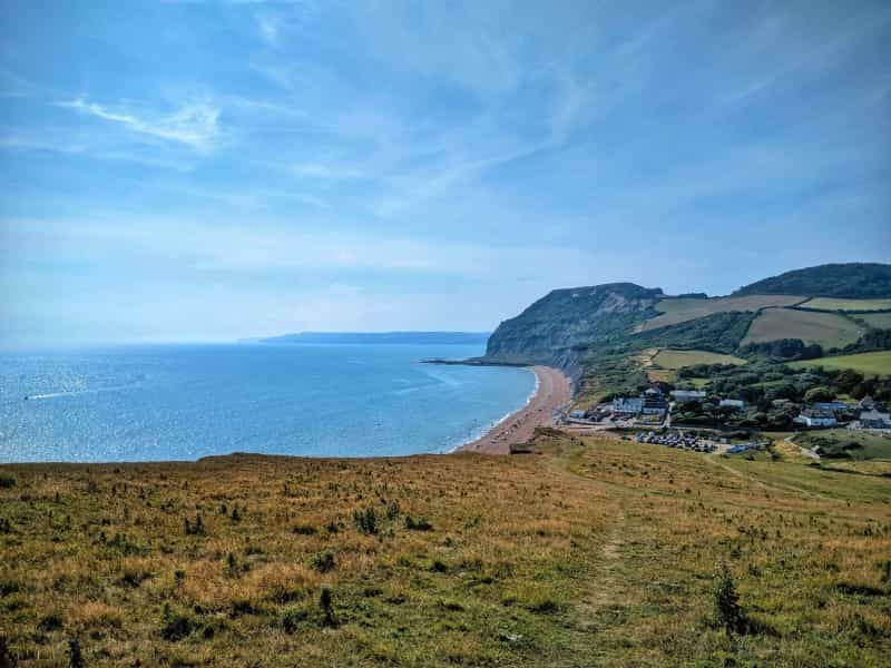 The approach to Seatown, Dorset from the South West Coast Path (John-Mark Strange on Unsplash)