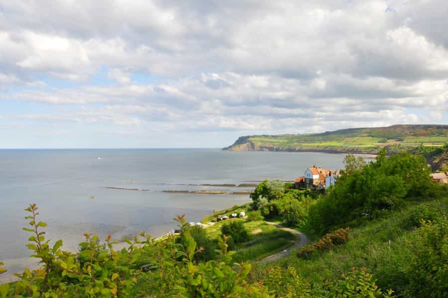 The coast at Robin Hood’s Bay (Andy Carne/Unsplash)
