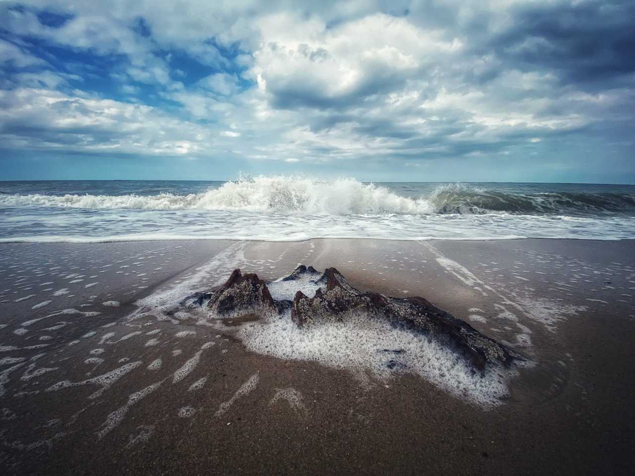 Take in the impressive sea views and some fresh air on the Norfolk Coast Path (Chris Spalton on Unsplash)