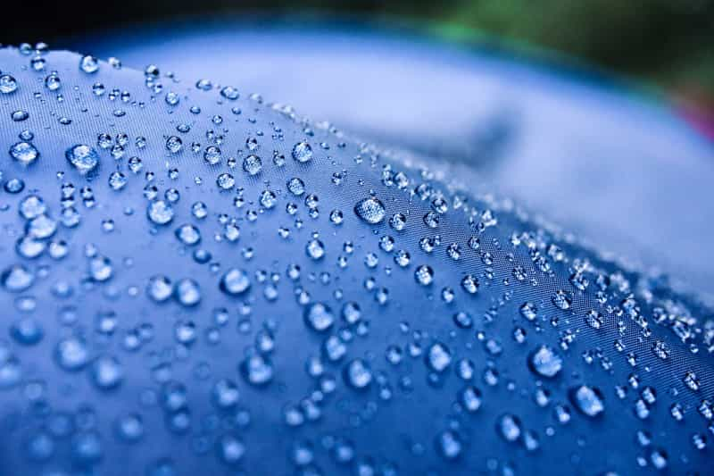 Droplets of water form beads on the tent’s fabric (Martin Banov / Pexels)