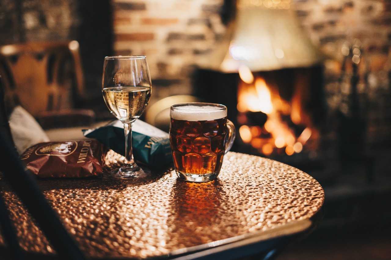 Relax with a pint and a glass of wine (Rick Barrett on Unsplash)