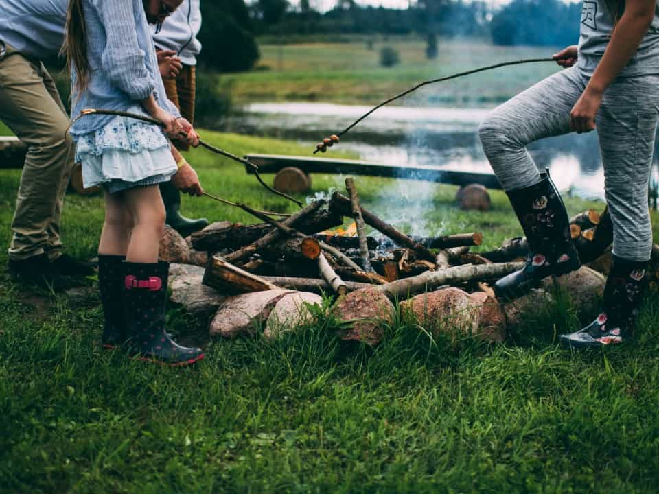 Family around campfire