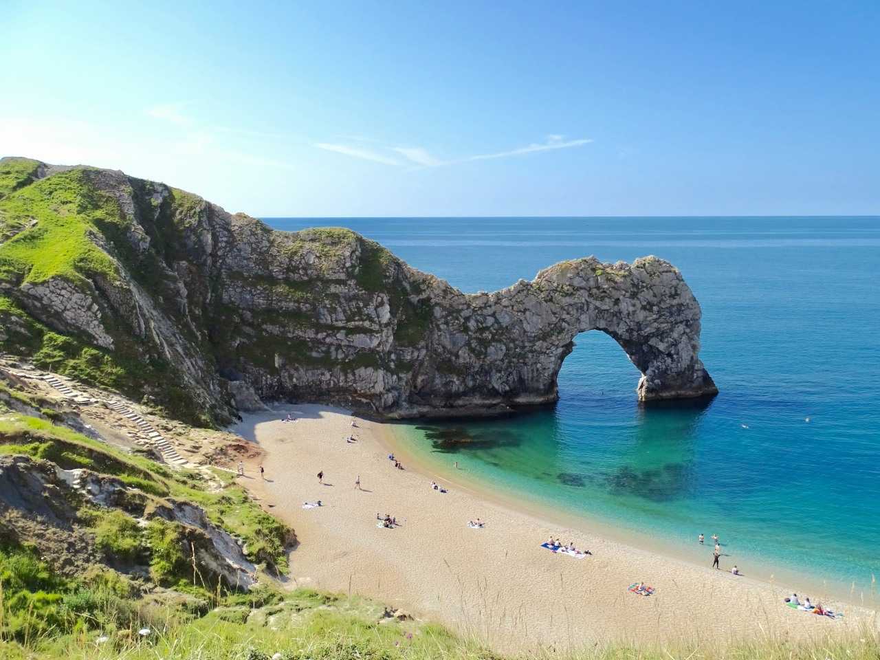 A summer day at Durdle Door beach in Dorset (Belinda Fewings on Unsplash)