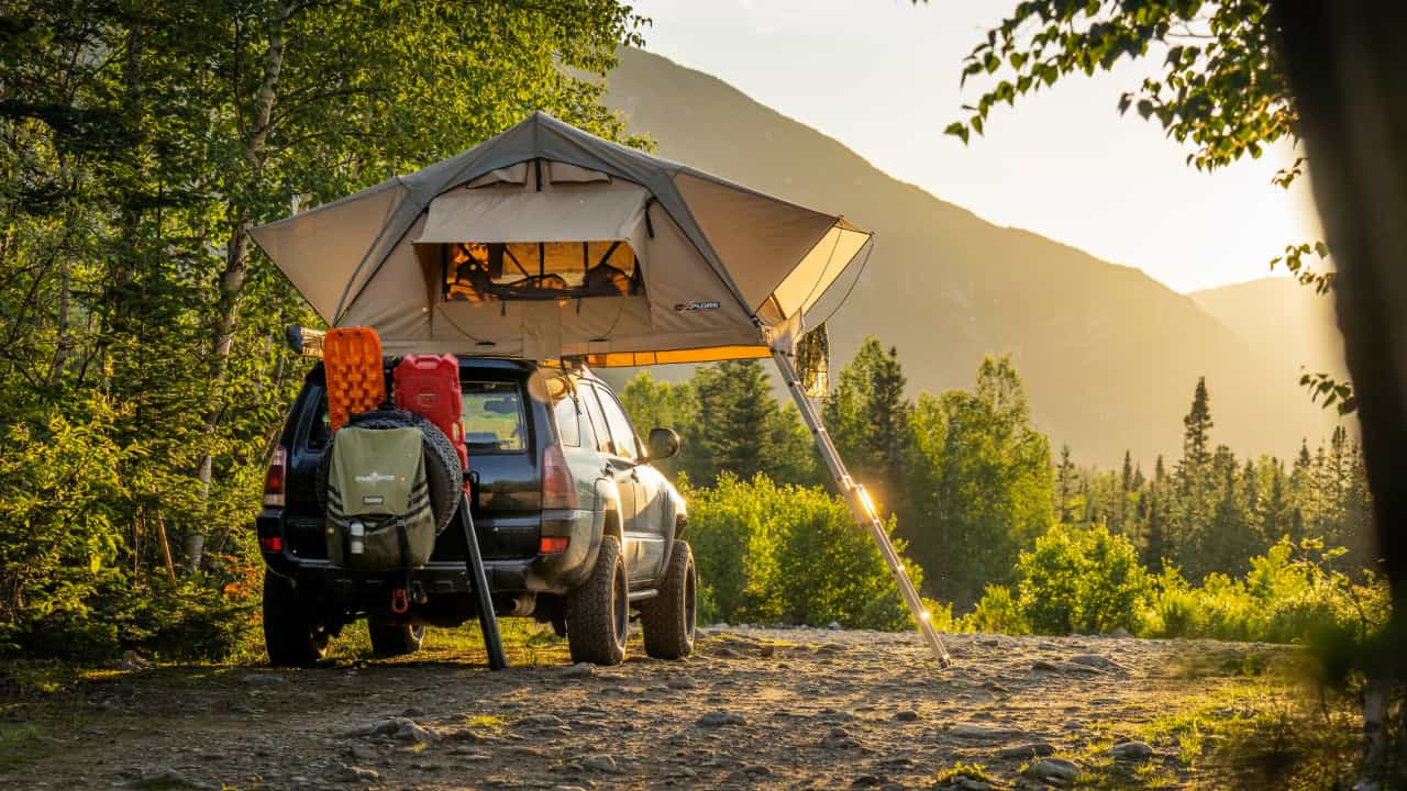 Transform your car into a comfortable pitch for the night with a rooftop tent (Alfred Boivin / Unsplash)