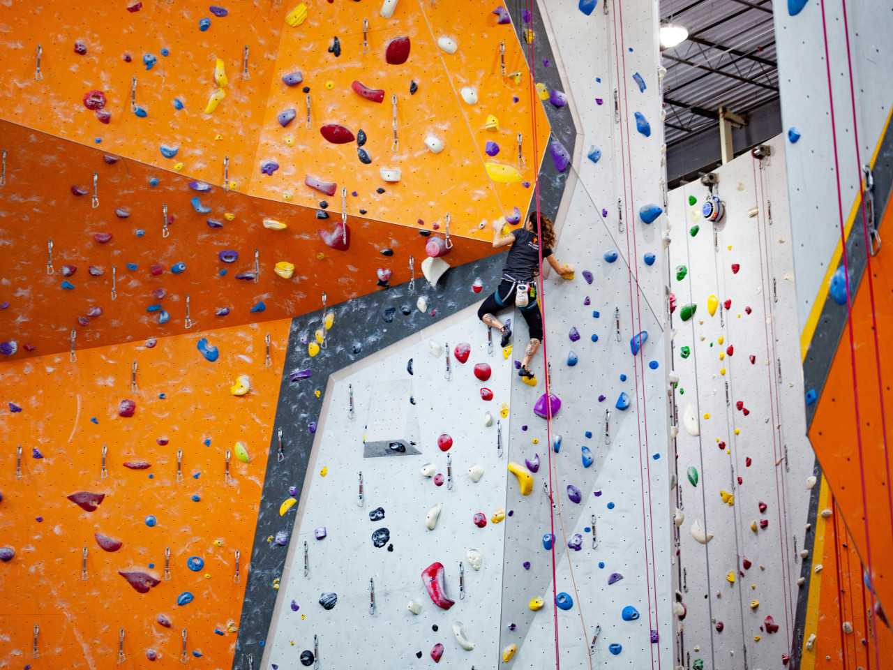 Person on indoor rock climbing wall