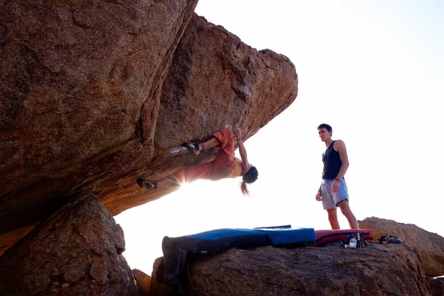 Climbing on an overhang (Mike Kotsch/Unsplash)