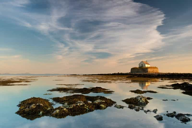 St Cwyfan’s Church on Anglesey (Neil Mark Thomas / Unsplash)