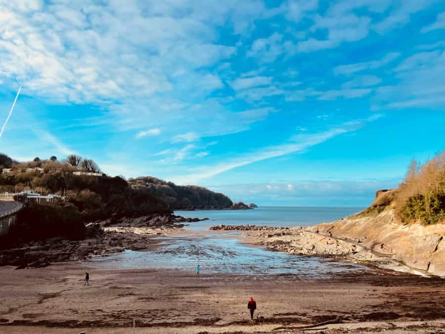 Sheltered Combe Martin beach is a lovely spot for a family day out (Helen Poll/Unsplash)