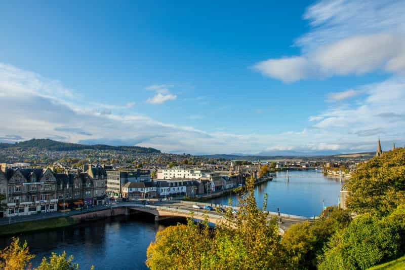 End your epic NC500 road trip by checking out the traditional Scottish pubs and second-hand bookstores of Inverness (Robin Canfield / Unsplash)