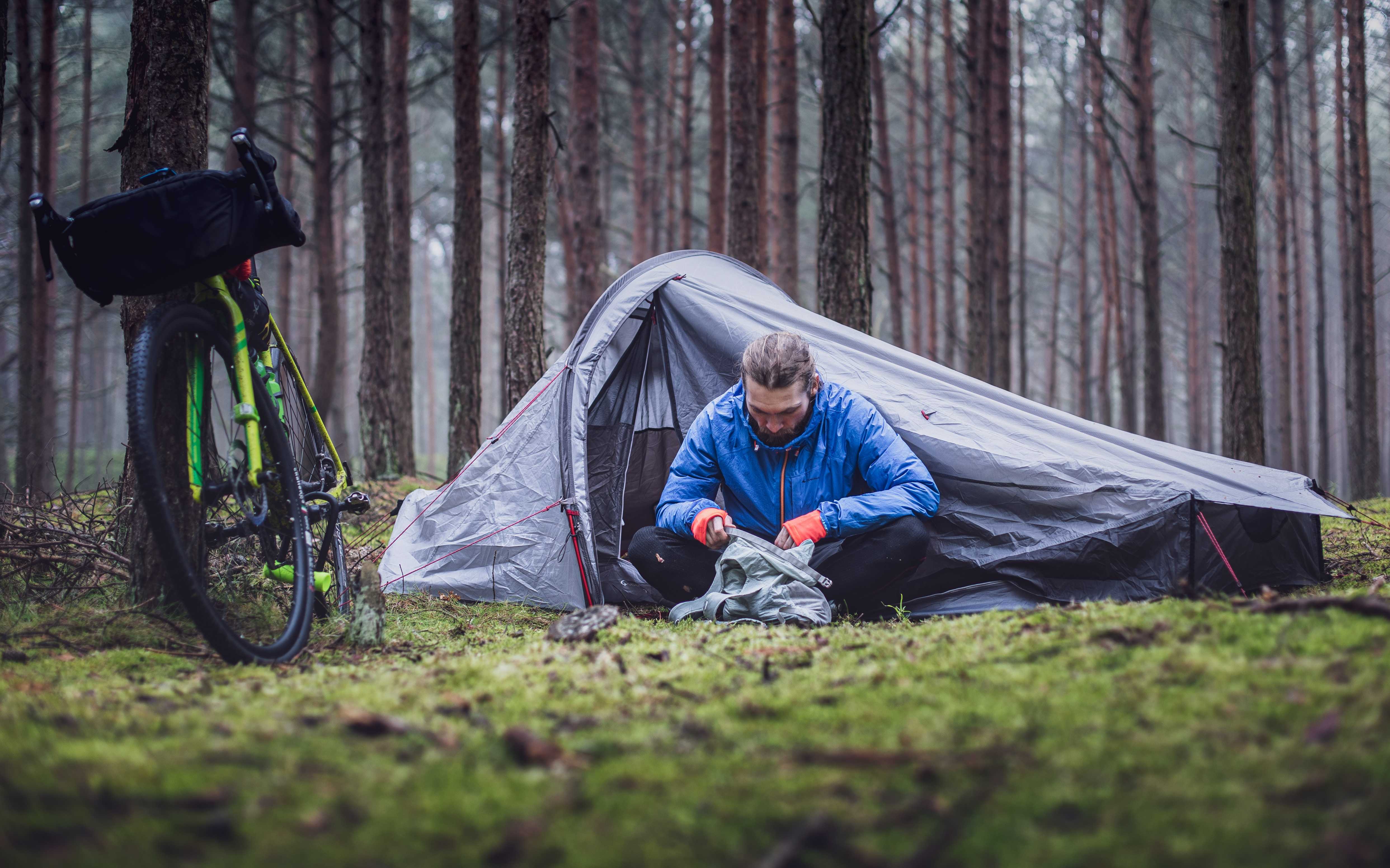 Camping without a car can bring you closer to nature (Marek Piwnicki/Unsplash)