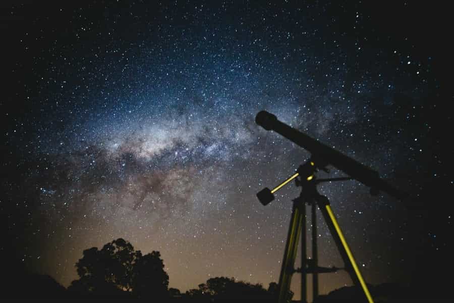 A tripod will help you steady your camera or telescope (Lucas Pezeta/Pexels)