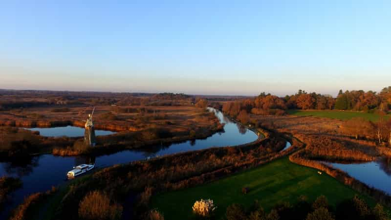 The Turf Fen Windpump next to the River Ant in The Broads (Andrew Banner on Unsplash)