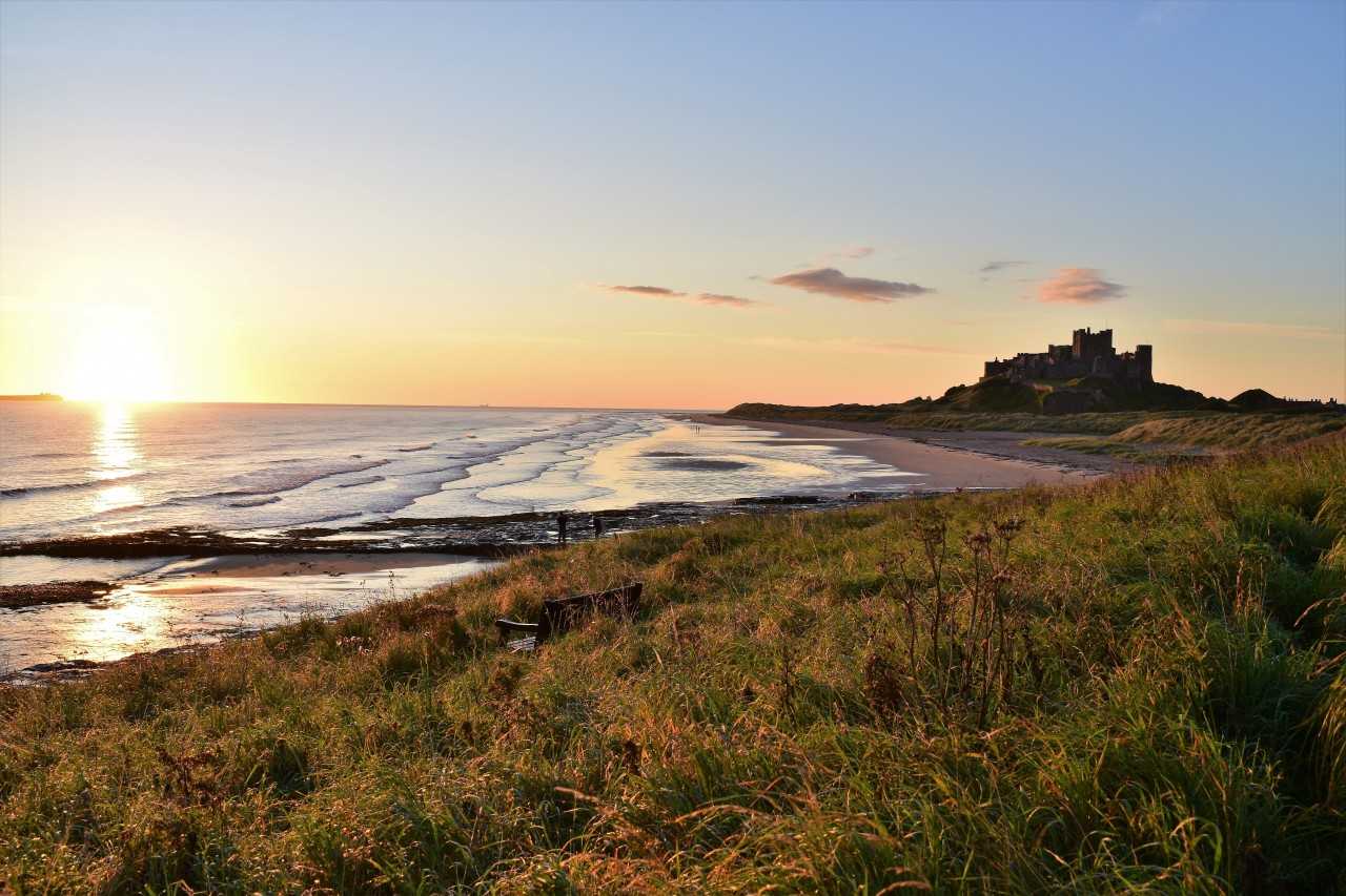 Sunrise at Bamburgh Castle (Bruce Edwards on Unsplash)