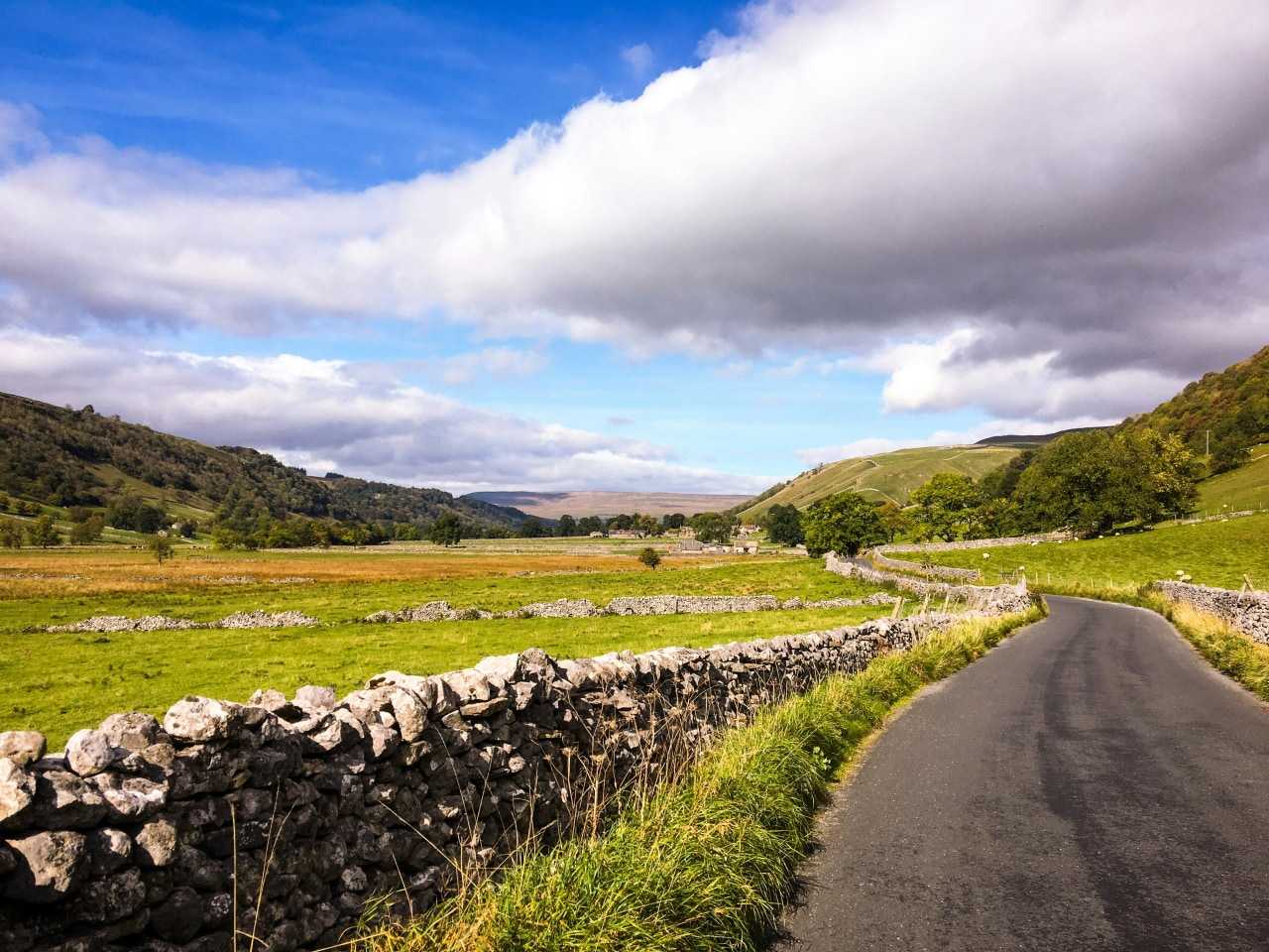There are miles of quiet lanes and roads to cycle along in the Yorkshire Dales (Gary Butterfield/Unsplash)